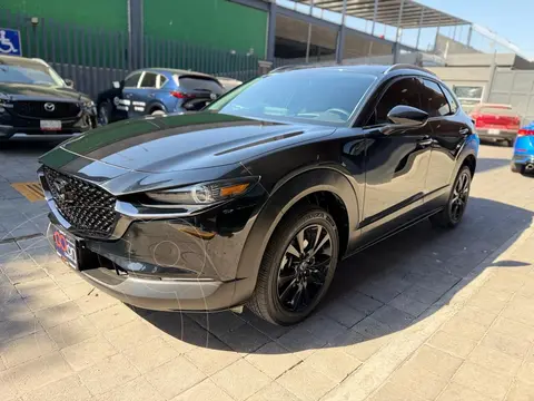 Mazda CX-30 Signature usado (2025) color Negro financiado en mensualidades(enganche $135,978 mensualidades desde $10,398)
