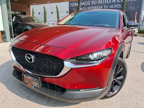 Mazda CX-30 Signature usado (2024) color Rojo financiado en mensualidades(enganche $135,705 mensualidades desde $10,377)
