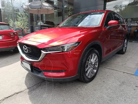 Mazda CX-5 i Grand Touring usado (2021) color Rojo financiado en mensualidades(enganche $44,700 mensualidades desde $12,800)