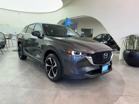 Mazda CX-5 Signature usado (2023) color Gris financiado en mensualidades(enganche $106,920 mensualidades desde $11,350)