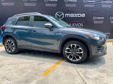 Mazda CX-5 2.0L i Grand Touring usado (2016) color Gris financiado en mensualidades(enganche $57,000 mensualidades desde $5,558)