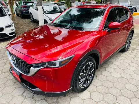 Mazda CX-5 Signature usado (2022) color Rojo financiado en mensualidades(enganche $138,944 mensualidades desde $12,341)