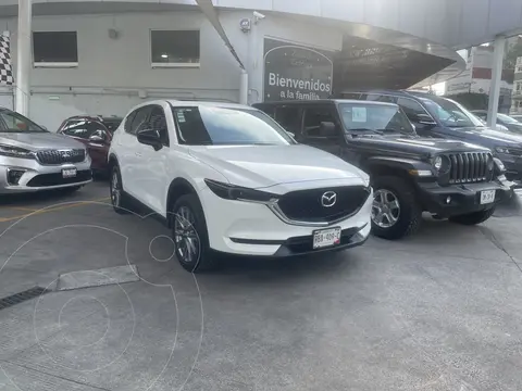 Mazda CX-5 2.0L i Grand Touring usado (2021) color Blanco Perla financiado en mensualidades(enganche $42,000 mensualidades desde $12,086)