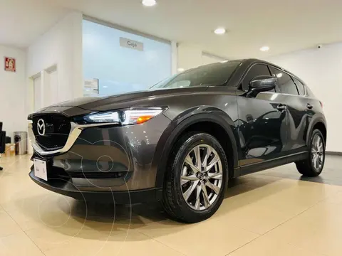 Mazda CX-5 Signature usado (2021) color Gris financiado en mensualidades(enganche $95,800 mensualidades desde $7,472)