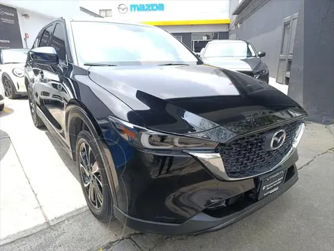 Mazda CX-5 s Grand Touring usado (2023) color Negro financiado en mensualidades(enganche $101,520 mensualidades desde $11,727)