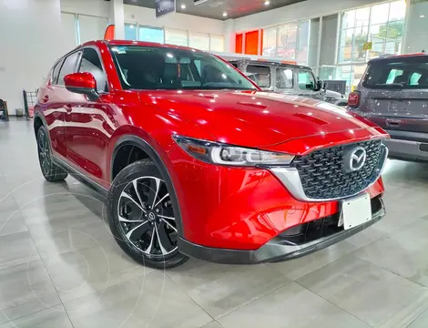 Mazda CX-5 i Sport usado (2023) color Rojo financiado en mensualidades(enganche $203,859 mensualidades desde $8,758)
