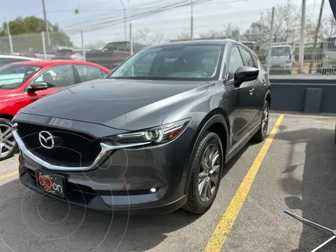 Mazda CX-5 i Grand Touring usado (2021) color Gris Oscuro financiado en mensualidades(enganche $114,178 mensualidades desde $8,731)