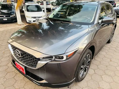 Mazda CX-5 Signature usado (2023) color Gris financiado en mensualidades(enganche $141,631 mensualidades desde $12,580)