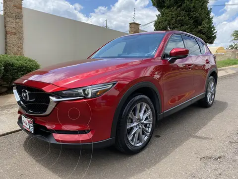 Mazda CX-5 2.5L S Grand Touring usado (2021) color Rojo financiado en mensualidades(enganche $76,000 mensualidades desde $12,000)