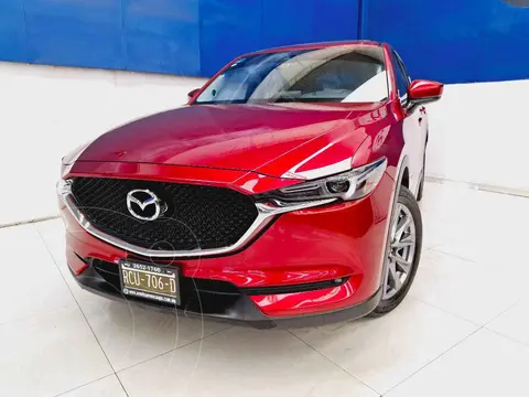 Mazda CX-5 Signature usado (2021) color Rojo financiado en mensualidades(enganche $133,252 mensualidades desde $10,974)