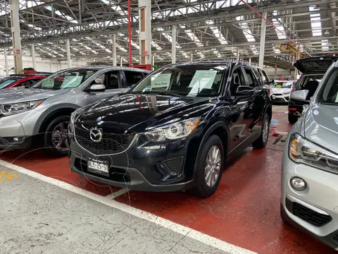 Mazda CX-5 2.0L iSport usado (2015) color Negro financiado en mensualidades(enganche $65,000 mensualidades desde $5,000)