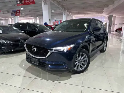 Mazda CX-5 i Grand Touring usado (2021) color Azul financiado en mensualidades(enganche $110,000 mensualidades desde $6,490)