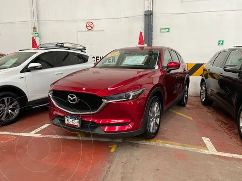 Mazda CX-5 Signature usado (2021) color Rojo financiado en mensualidades(enganche $132,000 mensualidades desde $11,000)