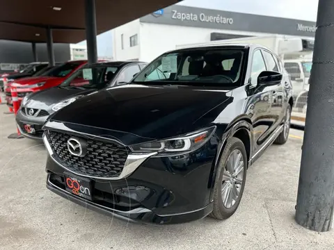 Mazda CX-5 s Grand Touring usado (2024) color Negro financiado en mensualidades(enganche $152,328 mensualidades desde $11,648)