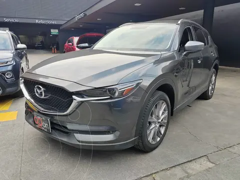 Mazda CX-5 2.0L i Grand Touring usado (2019) color Gris financiado en mensualidades(enganche $102,188 mensualidades desde $7,814)