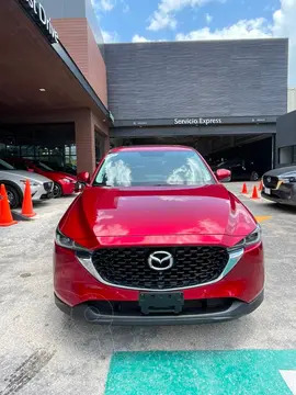 Mazda CX-5 Signature usado (2023) color Rojo financiado en mensualidades(enganche $98,560 mensualidades desde $9,780)