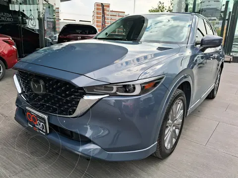 Mazda CX-5 Signature usado (2024) color Gris financiado en mensualidades(enganche $160,502 mensualidades desde $12,274)
