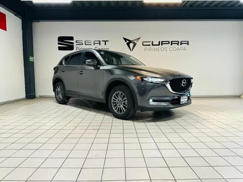 Mazda CX-5 2.0L i Sport usado (2020) color Gris financiado en mensualidades(enganche $85,800 mensualidades desde $8,487)