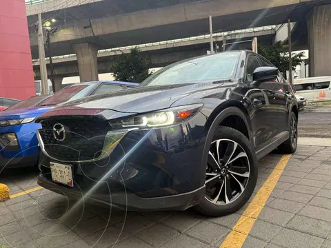 Mazda CX-5 s Grand Touring usado (2022) color Azul financiado en mensualidades(enganche $120,938 mensualidades desde $10,742)