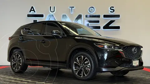 Mazda CX-5 Signature usado (2023) color Negro financiado en mensualidades(enganche $96,580 mensualidades desde $10,345)