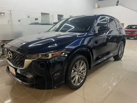 Mazda CX-5 s Grand Touring usado (2025) color Azul Acero financiado en mensualidades(enganche $144,152 mensualidades desde $12,375)