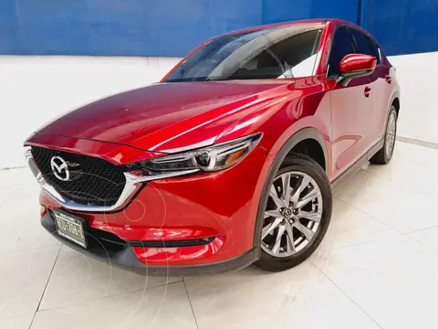 Mazda CX-5 Signature usado (2021) color Rojo financiado en mensualidades(enganche $124,532 mensualidades desde $10,256)