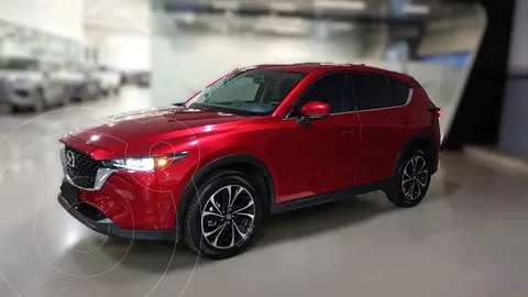 Mazda CX-5 s Grand Touring usado (2023) color Rojo financiado en mensualidades(enganche $181,018 mensualidades desde $8,222)