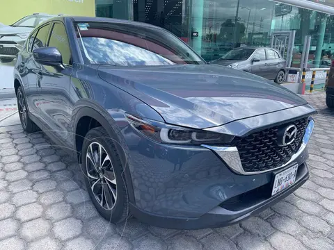 Mazda CX-5 Signature usado (2023) color Gris financiado en mensualidades(enganche $137,062 mensualidades desde $11,573)