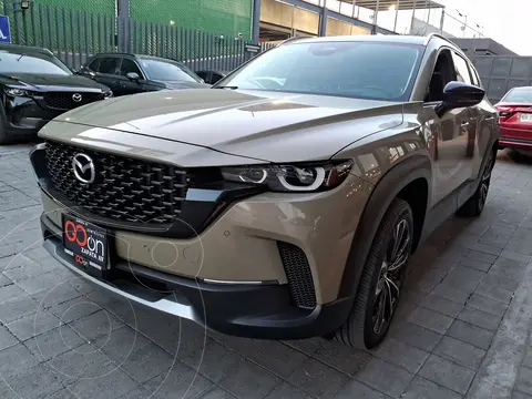 Mazda CX-50 Signature usado (2025) color Dorado financiado en mensualidades(enganche $190,478 mensualidades desde $14,566)