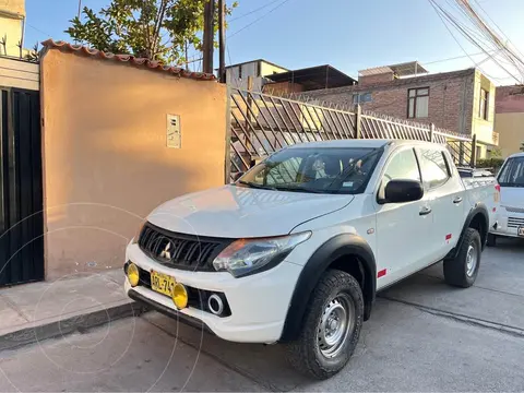 Mitsubishi L200 DK-R 2.5L TD GLX 4x4 usado (2016) color Blanco precio u$s15,300