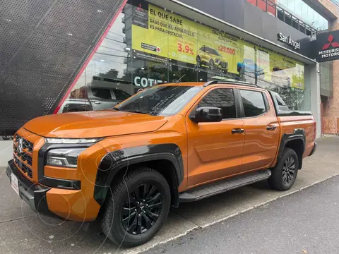 Mitsubishi L200 GSR 4x4 Diesel usado (2025) color Naranja financiado en mensualidades(enganche $160,160 mensualidades desde $15,283)