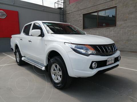 Mitsubishi L200 4x2 2.4L Cabina Doble usado (2018) color Blanco financiado en mensualidades(enganche $105,152 mensualidades desde $8,211)