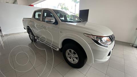 foto Mitsubishi L200 4x2 2.4L Cabina Doble financiado en mensualidades enganche $76,500 mensualidades desde $7,900