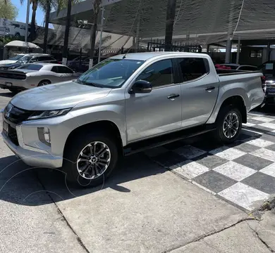 Mitsubishi L200 GLS Diesel  4x4 Aut usado (2024) color Plata Metalico financiado en mensualidades(enganche $174,750 mensualidades desde $14,782)