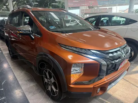Mitsubishi Xpander 1.5L usado (2023) color naranja oscuro financiado en mensualidades(enganche $133,342 mensualidades desde $5,610)