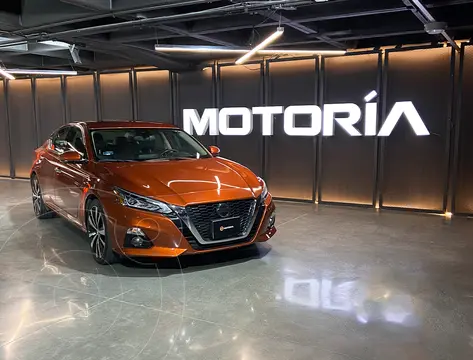 Nissan Altima Exclusive Turbo usado (2022) color naranja oscuro financiado en mensualidades(enganche $114,000 mensualidades desde $8,588)