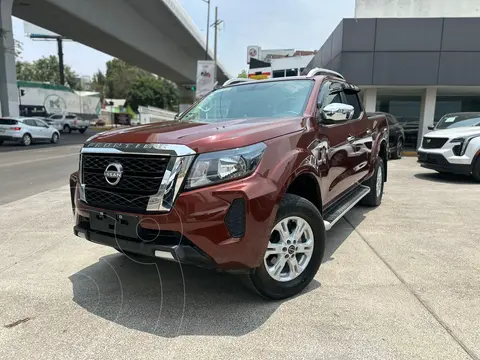 Nissan Frontier  LE usado (2024) color naranja oscuro financiado en mensualidades(enganche $122,100 mensualidades desde $13,708)
