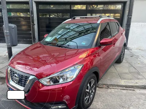 Nissan Kicks Sense usado (2021) color Rojo financiado en cuotas(anticipo $9.000.000 cuotas desde $1.230.425)