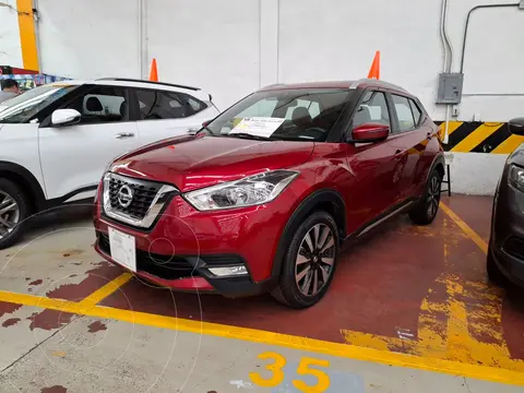 Nissan Kicks Exclusive Aut usado (2017) color Rojo Metalizado financiado en mensualidades(enganche $61,000 mensualidades desde $5,500)