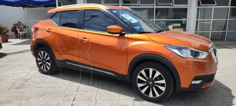 Nissan Kicks Exclusive Aut usado (2020) color Naranja Metalico financiado en mensualidades(enganche $86,424 mensualidades desde $7,114)