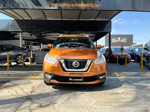 Nissan Kicks Exclusive Aut usado (2018) color Naranja Metalico financiado en mensualidades(enganche $78,725 mensualidades desde $9,733)