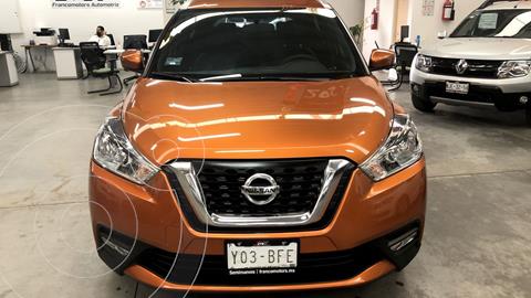Nissan Kicks Exclusive Aut usado (2020) color Naranja Metalico financiado en mensualidades(enganche $91,820 mensualidades desde $7,752)