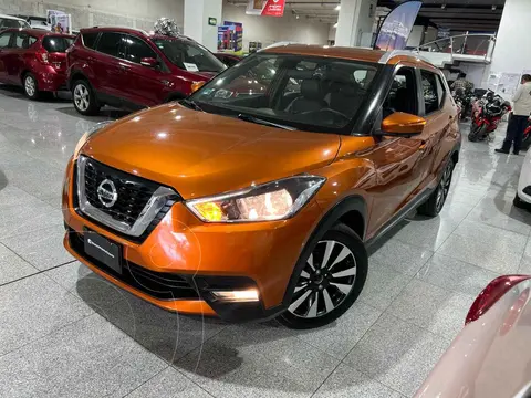 Nissan Kicks Exclusive Aut usado (2020) color Naranja financiado en mensualidades(enganche $95,102 mensualidades desde $7,275)