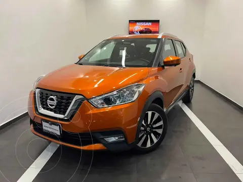 Nissan Kicks Exclusive Aut usado (2020) color Naranja financiado en mensualidades(enganche $66,000 mensualidades desde $6,511)