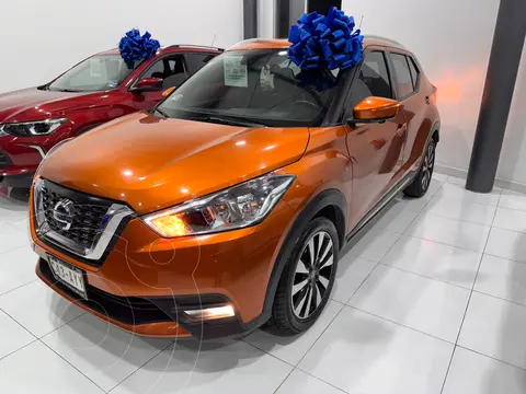 Nissan Kicks Exclusive Aut usado (2018) color Naranja Metalico financiado en mensualidades(enganche $108,811 mensualidades desde $7,670)