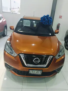 Nissan Kicks Exclusive Aut usado (2018) color Naranja Metalico financiado en mensualidades(enganche $95,416 mensualidades desde $4,782)