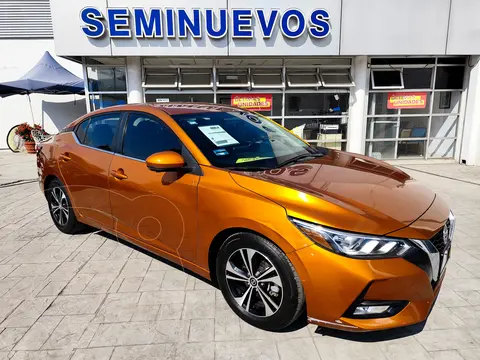 Nissan Sentra Advance Aut usado (2021) color Naranja Solar financiado en mensualidades(enganche $81,963 mensualidades desde $7,477)