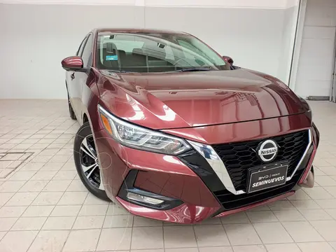 Nissan Sentra Advance usado (2022) color Rojo Cobrizo financiado en mensualidades(enganche $138,612 mensualidades desde $5,955)