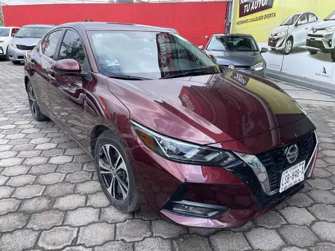 Nissan Sentra Advance Aut usado (2023) color Vino Tinto financiado en mensualidades(enganche $91,375 mensualidades desde $7,715)