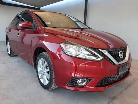 Nissan Sentra Advance Aut usado (2017) color Rojo financiado en mensualidades(enganche $53,600)